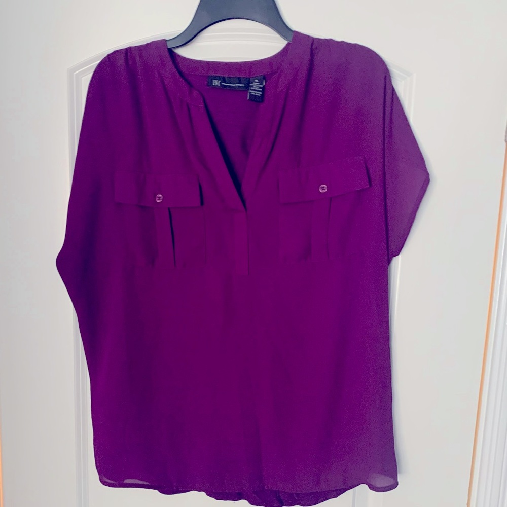 INC International Concepts®' purple top with a V-neck and short sleeves